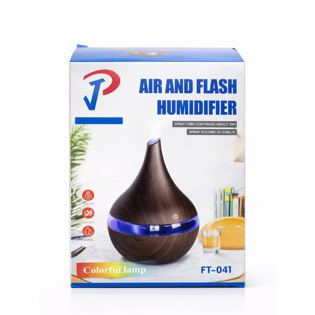 Box of an air and flash humidifier with a wooden diffuser on a white background