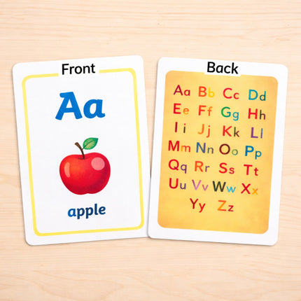 Alphabet learning card with letter A and apple illustration on a wooden surface
