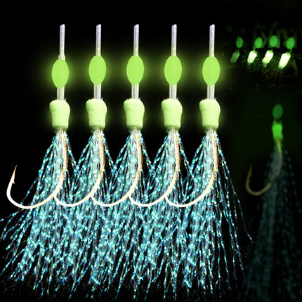 Set of glowing fishing lures with multiple hooks on a dark background