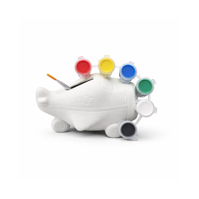 White piggy bank with paint canisters on a white background