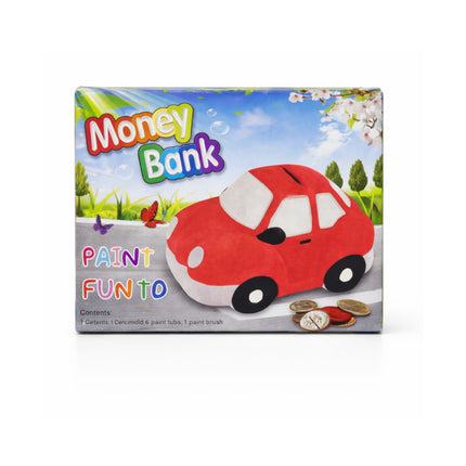 Box of a red car-shaped money bank with paint supplies on a white background