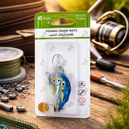 Fishing crank bait packaging on a wooden surface with fishing equipment.