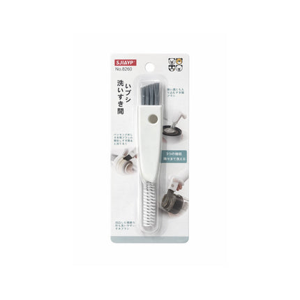 Cleaning brush with packaging on a white background