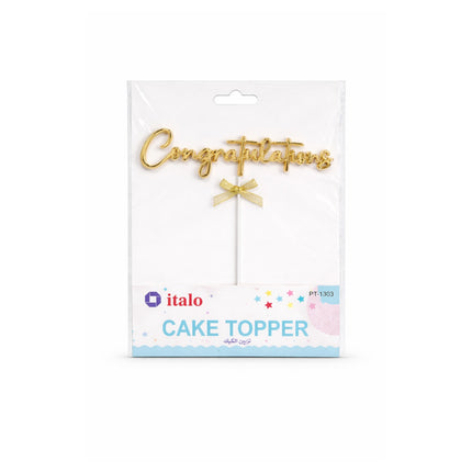 Gold 'Congratulations' cake topper with a bow on a white packaging labeled 'italo'.