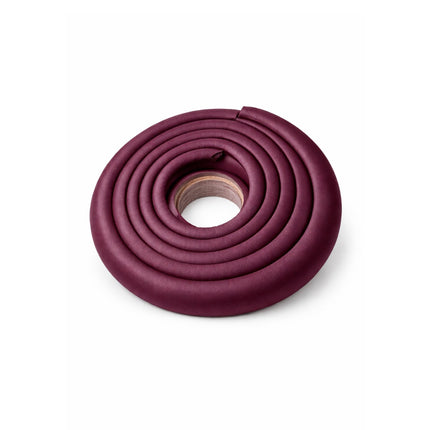 Purple silicone hose on a white background
