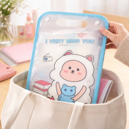 Cartoon character pouch with 'I Very Miss You' text held by a hand.