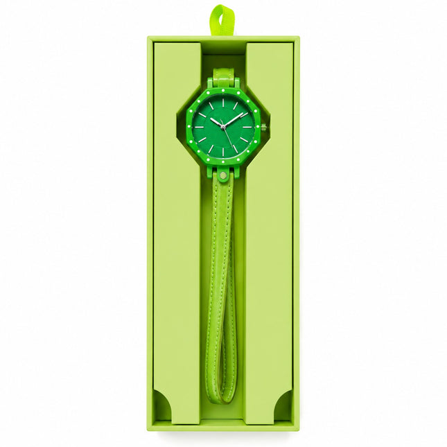 A bright lime green wristwatch with a matching green dial and strap, presented inside a tall lime green gift box on a white background.