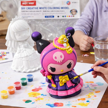 Colorful toy figure being painted with art supplies on a table