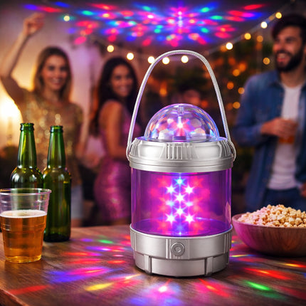 LED light projector on a table with people and snacks in the background