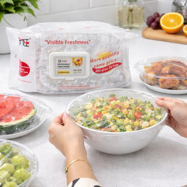 Person holding a bowl of salad with visible freshness packaging in the background