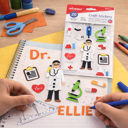 Craft stickers with doctor and science-themed designs on a table with stationery items.