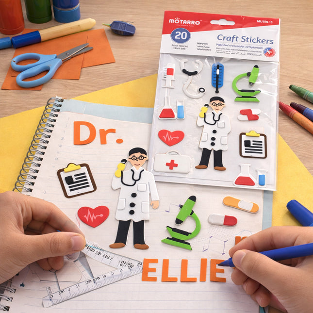 Craft stickers with doctor and science-themed designs on a table with stationery items.