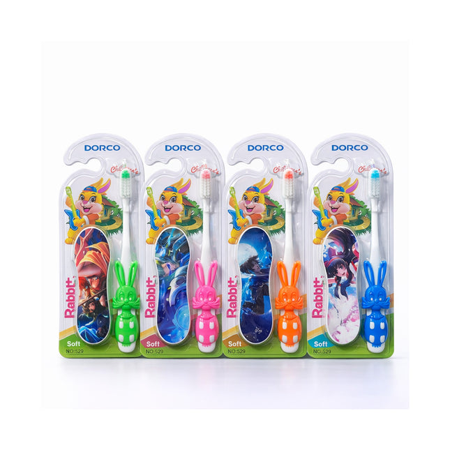 Four packages of Dorco children's toothbrushes with cartoon characters on a white background