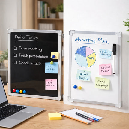 Blackboard with daily tasks and whiteboard with marketing plan on a desk with laptop and stationery.