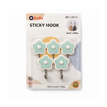 Packaged sticky hooks with floral design on a white background