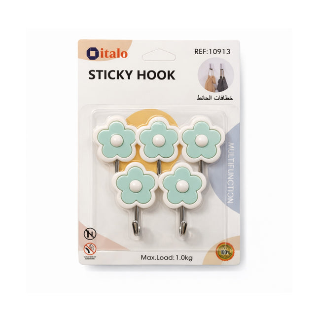 Packaged sticky hooks with floral design on a white background