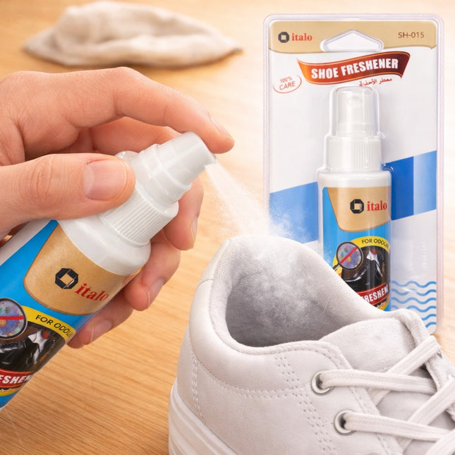 Person using a shoe freshener spray on a white shoe with product packaging in the background.