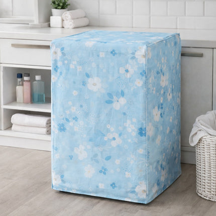 Blue floral-patterned washing machine cover in a laundry room.