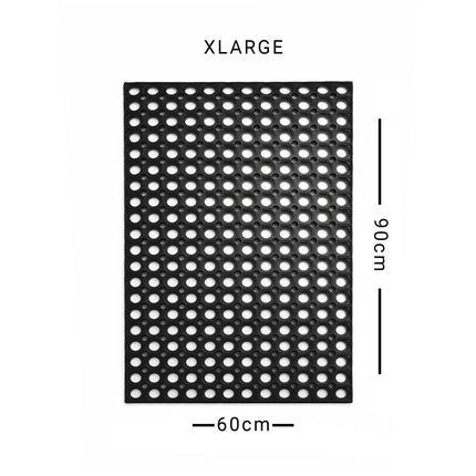 Black perforated mat with dimensions 60cm x 90cm on a white background