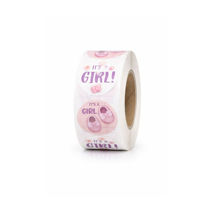 Roll of stickers with 'It's a Girl!' text and baby footprints on a white background