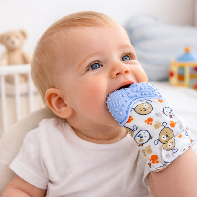 Baby wearing a blue and white teething band with cartoon designs, sitting in a crib.