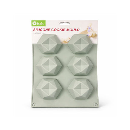 Silicone cookie mold with geometric shapes on a white background
