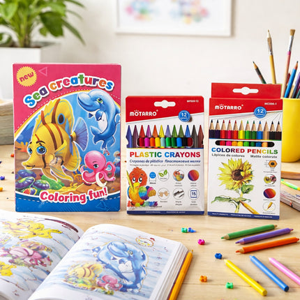 Coloring book and art supplies including crayons and colored pencils on a table.