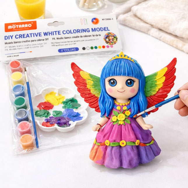 Colorful fairy figurine with paint set and paintbrush on a white background