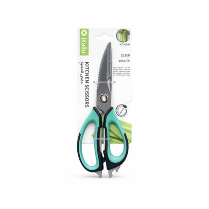 Kitchen scissors with green handles on a white background