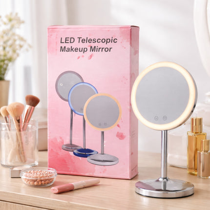 LED Telescopic Makeup Mirror with packaging on a table with makeup items.