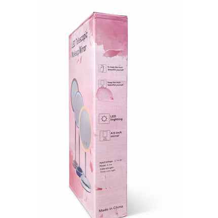 Pink packaging box for a LED telescopic makeup mirror on a white background