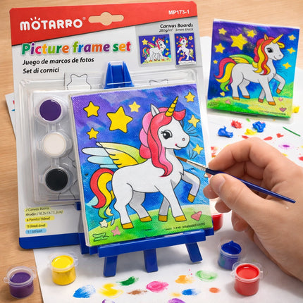 Motarro picture frame set with a unicorn painting and paint supplies on a table.