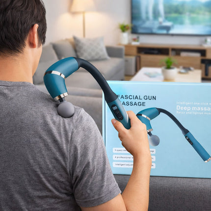 Person using a blue fascial gun in a living room with a TV in the background