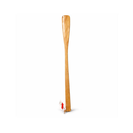 Wooden spatula on a white background
