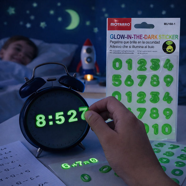 Glow-in-the-dark sticker with numbers applied to a clock, with packaging in the background.