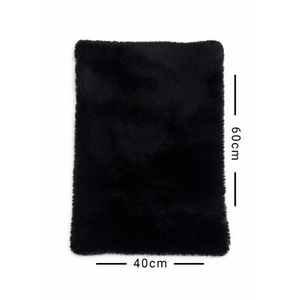 Black rectangular rug with measurements on a white background