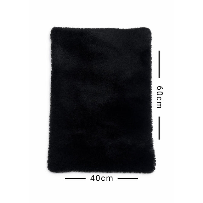 Black rectangular rug with measurements on a white background