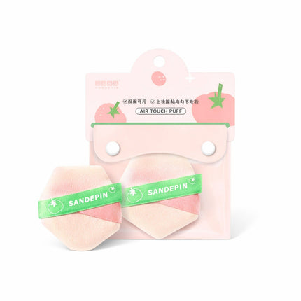 Two air touch puffs with a pink and green band labeled 'SANDEPIN' on a white background.