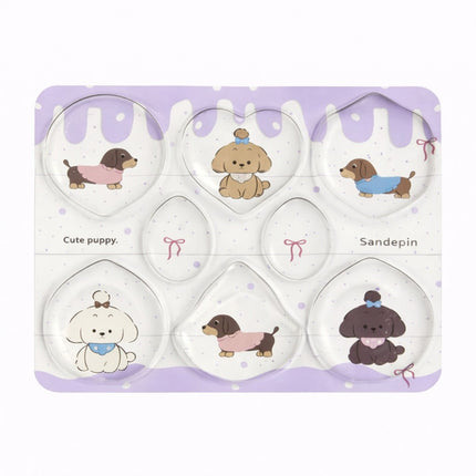 Set of cute puppy-themed items in a packaging with cartoon dogs on a purple background.