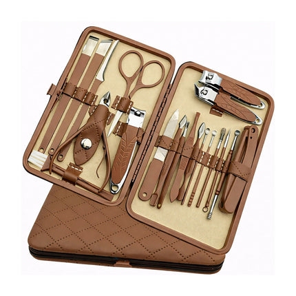 Manicure set with tools in a brown case on a white background