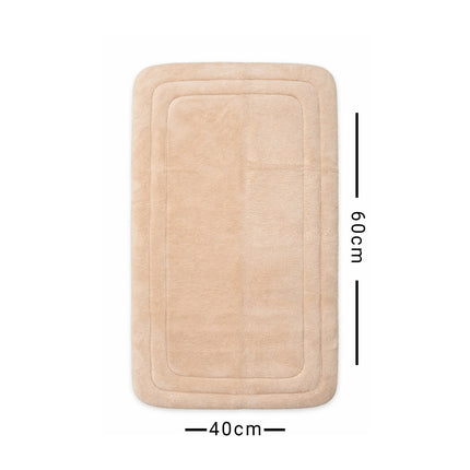 Beige bath mat with dimensions on a white background