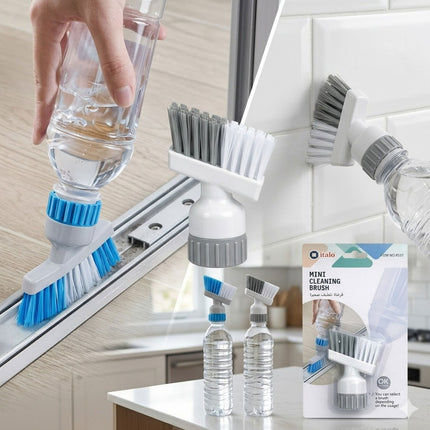 Cleaning brush set with water bottles and packaging on a kitchen counter.