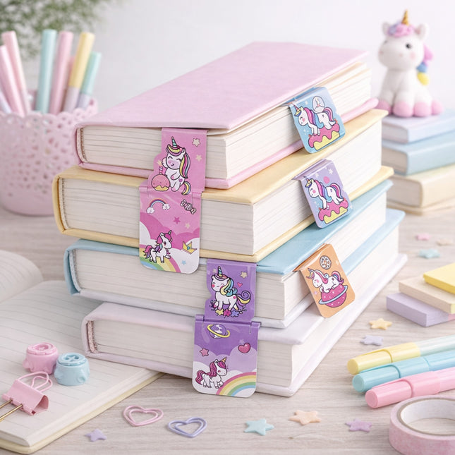 Stack of books with colorful unicorn bookmarks on a desk with stationery items.