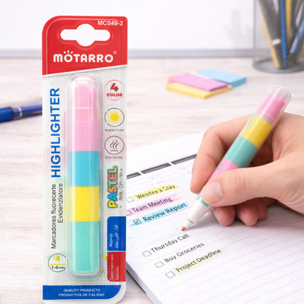 Colorful highlighter pens with packaging and a hand using one on a notepad.