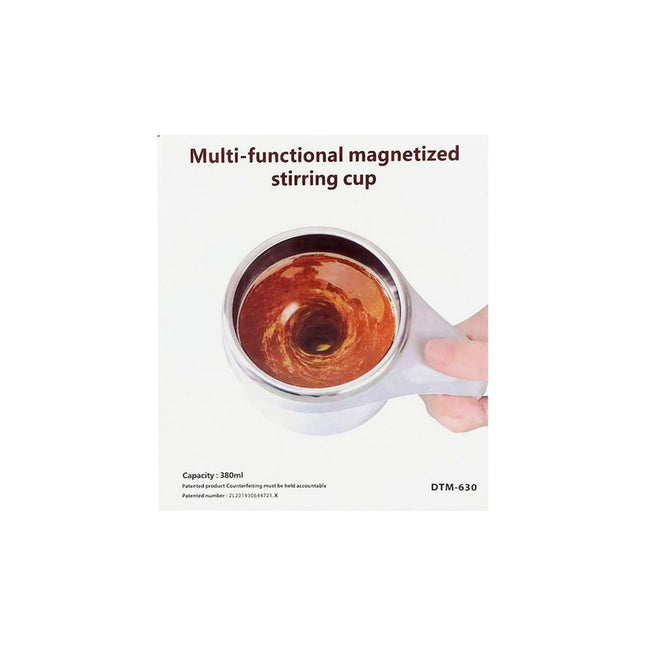 Multi-functional magnetized stirring cup with a hand holding it, on a white background.