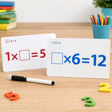 Mathematical problem-solving cards on a wooden table with educational materials.
