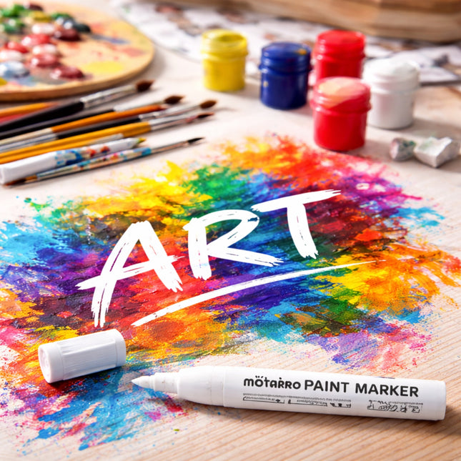 Art supplies including paint markers, brushes, and a colorful 'ART' sign on a wooden surface.