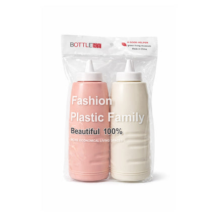 Two plastic bottles in pink and white with a clear packaging bag labeled 'BOTTLEMY' on a white background.