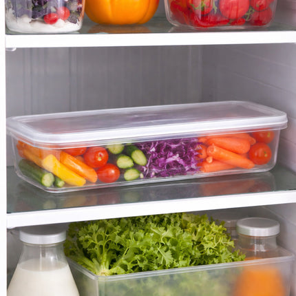 Fridge with containers of vegetables and other food items.