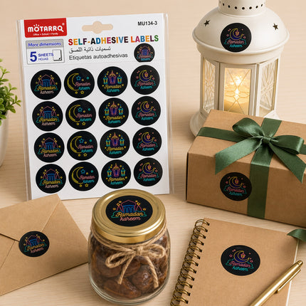 Moterro self-adhesive labels with a gift box, jar of cookies, and notebook on a wooden surface.